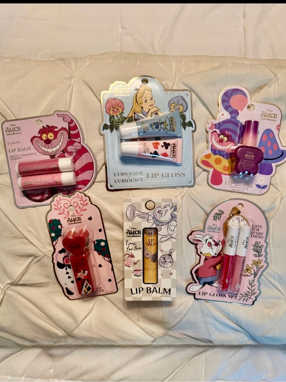 Disney Alice in Wonderland Lip balm/gloss Set — 6 NWT packs.